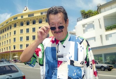 SYDNEY, AUSTRALIA - JANUARY 29: Australian actor Michael Caton poses during a photo shoot at Bondi Beach on January 29, 1999 in Sydney, Australia. (Photo by Peter Carrette Archive/Getty Images)