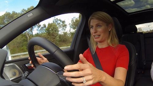 A Current Affair reporter Alison Piotrowski test-drives the driverless Volvo, with only light pressure on the wheel for legal reasons.