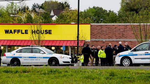 Four people were shot dead  by a near-naked gunman at the Nashville restaurant. (AP/AAP)