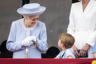 Queen Elizabeth II and Prince Louis watch from the balcony of Buckingham Place after the Trooping the Color ceremony in London, Thursday, June 2, 2022, on the first of four days of celebrations to mark the Platinum Jubilee. The events over a long holiday weekend in the U.K. are meant to celebrate the monarch's 70 years of service.