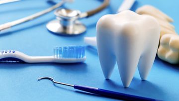 A dentist has been charged with allegedly indecently assaulting a teenage employee in Western Australia.