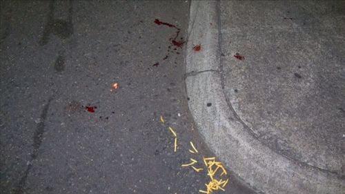 Blood and fast-food at the scene. (9NEWS)
