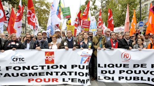 French public sector workers strike and protest against Macron in Paris. (AAP)