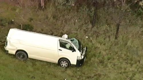 The allegedly stolen van lost control and struck a VicRoads truck (9NEWS)