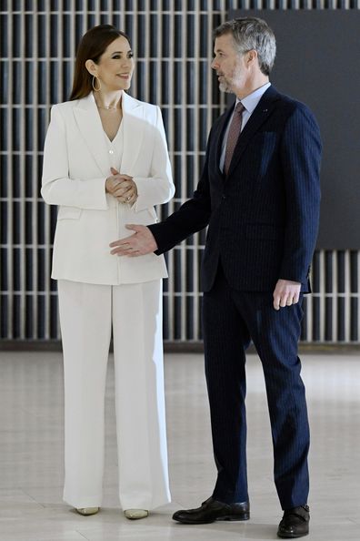 Denmark's King Frederik X and Queen Mary wait for guests as they host a reception at the Finlandia Hall in Helsinki, Finland, Wednesday, March 5, 2025. (Heikki Saukkomaa/Lehtikuva via AP)