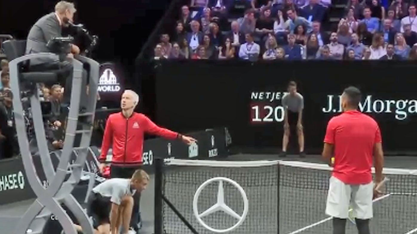 John McEnroe and NIck Kyrgios argue with the chair umpire