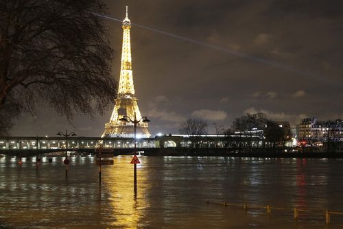 The Seine River has burst its banks, flooding parts of Paris. (AAP)