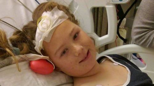 Pictures have been released of Tasmanian girl Phoenix Newitt waking from a coma after she was shot in the face, while sitting in her mother's car.