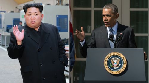 President Barack Obama signs order implementing US sanctions on North Korea