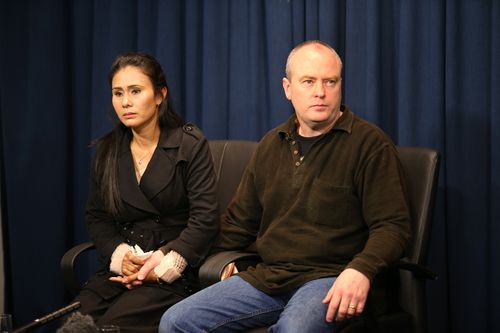 The parents of missing Victorian schoolgirl Siriyakorn "Bung" Siriboon, Vanidda Siriyakorn (left) and Fred Patterson, hold a press conference at police headquarters in Melbourne, Tuesday, Feb. 4, 2014. 