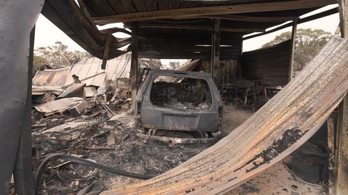 The remains of a burnt property is seen in Tingha in northern New South Wales, Wednesday, February 14, 2019.