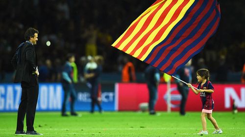 Luis Enrique manager of Barcelona and daughter Xana celebrate victory after the UEFA Champions League Final between Juventus and FC Barcelona in June 2015.