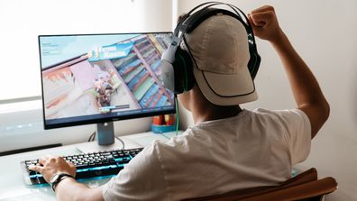 Teen boy gaming online screen time kids children