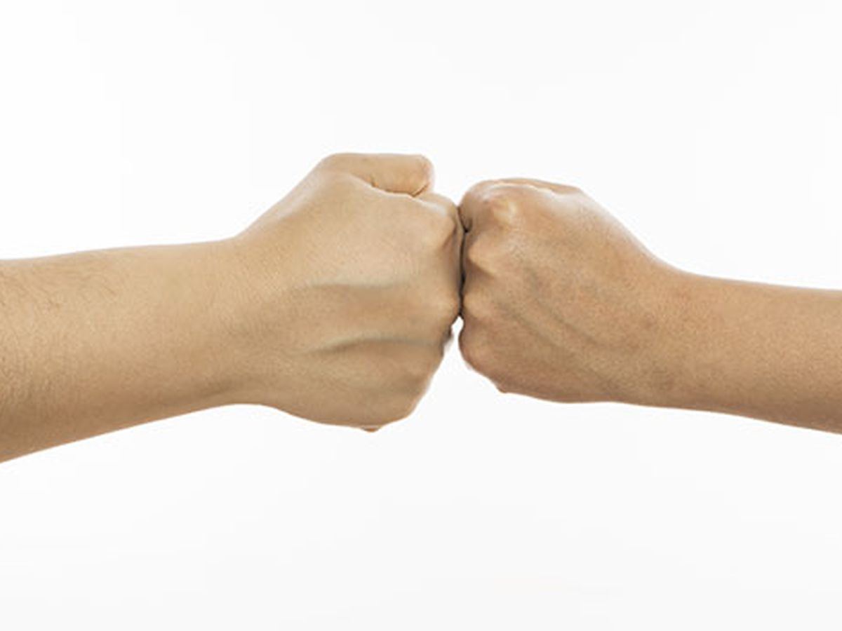 Fist bump, handshake, high-five: Which spreads the most germs? - CBS News