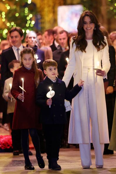 LONDON, ENGLAND - DECEMBER 08: Princess Charlotte of Wales, Prince Louis of Wales and Catherine, Princess of Wales attend The "Together At Christmas" Carol Service at Westminster Abbey on December 08, 2023 in London, England. Spearheaded by The Princess of Wales, and supported by The Royal Foundation, the service is a moment to bring people together at Christmas time and recognise those who have gone above and beyond to help others throughout the year. (Photo by Chris Jackson/Getty Images)