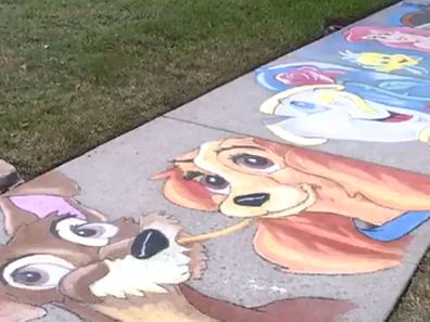 Brian Morris does Disney chalk drawings on his street footpath in Florida