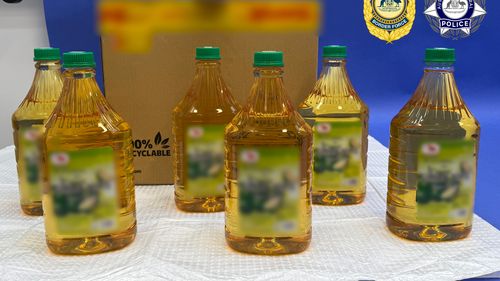 A drug-detecting dog returned a positive result for the bottles of cordial and oil, found in the shipment. 