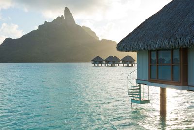 Stay in an overwater bungalow in Bora Bora