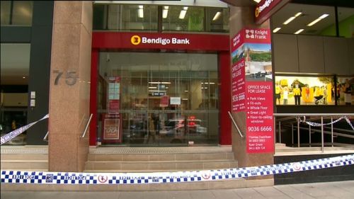 Men flee with cash after brazen Sydney CBD bank robbery