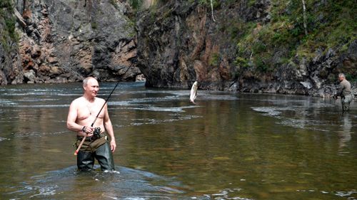 Mr Putin went fishing during his trip. (AP)