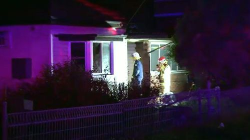 Man kicks down front door to rescue girlfriend from Sydney house fire 