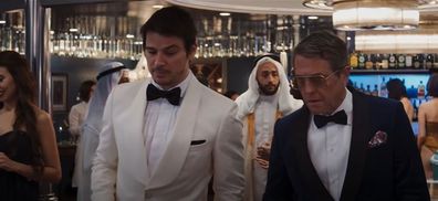 Josh Hartnett and Hugh Grant's characters in Operation Fortune: Ruse de guerre 