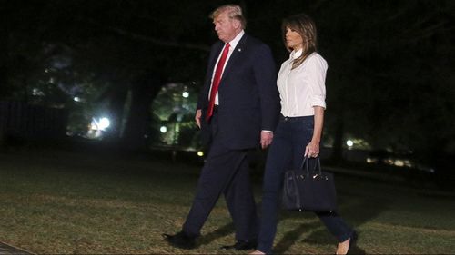 Donald and Melania Trump arrive at the White House after their Europe trip. (AAP)