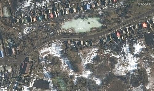 This satellite image provided by Maxar Technologies is showing parts of a military convoy moving south in and around Golovchino in Russia, which is 16 kilometres north of the border with Ukraine.