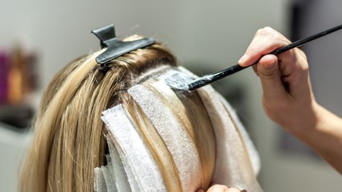 Women should limit dying their hair to five times a year, the surgeon advised. (Getty)