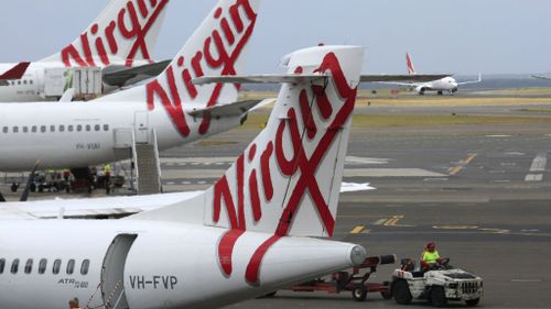 Measles alert issued after infected passenger arrives at Brisbane Airport