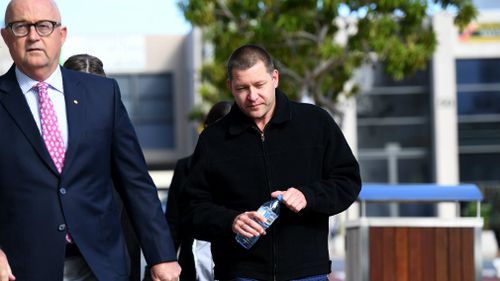 Thunder River Rapids ride operator Peter Nemeth (right) and his lawyer Ralph Devlin QC arrive for the inquest into the Dreamworld disaster. Picture: AAP