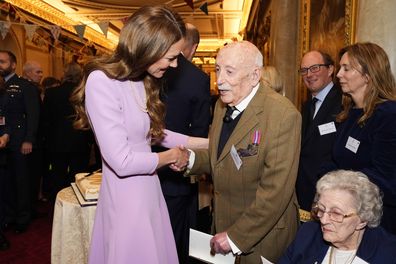 LONDON, ENGLAND - APRIL 21: Catherine, Princess of Wales speaks with John Jervois as she attends a reception at Buckingham Palace, on the 100th anniversary of the birth of Queen Elizabeth II on April 21, 2026 in London, England. (Photo by Jordan Pettitt - Pool/Getty Images)