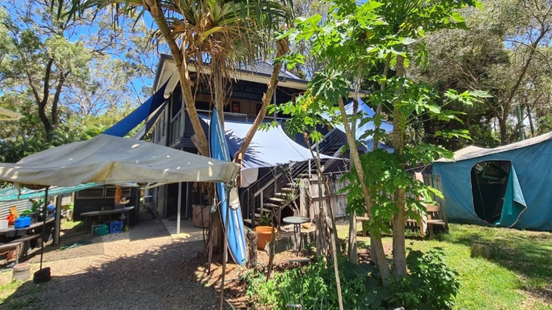 Queensland's 'hoarder's paradise' with 'fridges everywhere you look' sells for bargain price