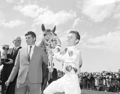 Trainer Bart Cummings and jockey Roy Higgins with Light Fingers after winning the 1965 Melbourne Cup