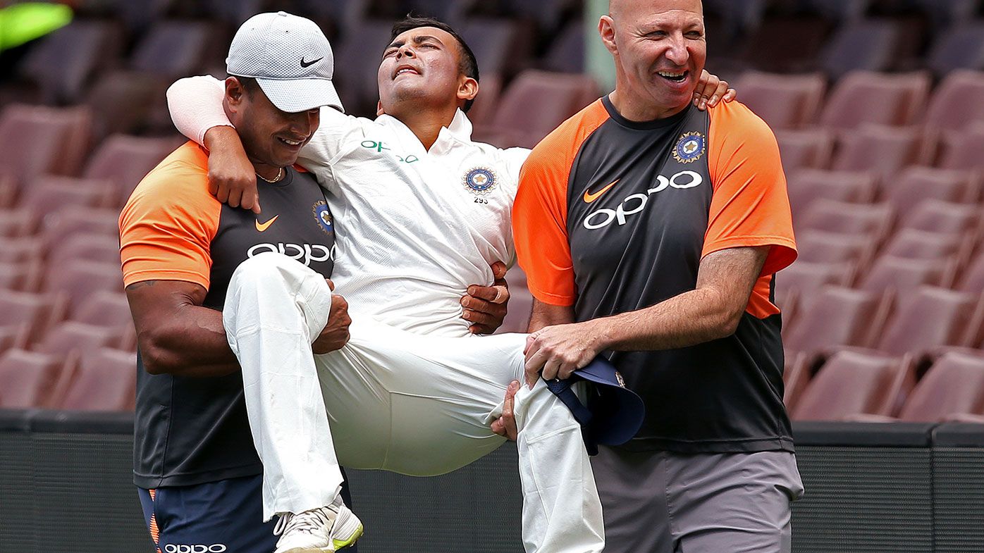Prithvi Shaw is carried from the field at the SCG.