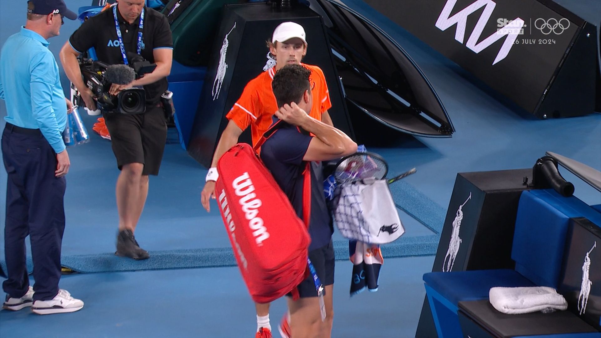 Milos Raonic retirement puts Alex de Minaur through to Australian Open second round