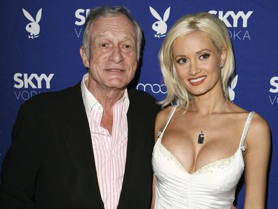 Hugh Hefner and Holly Madison attend the Playboy and Skyy Vodka Party on July 18, 2006 in Los Angeles, California.