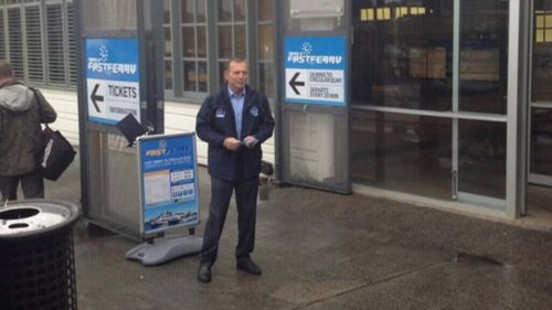 Abbott posts photo of himself greeting commuters at Manly Wharf