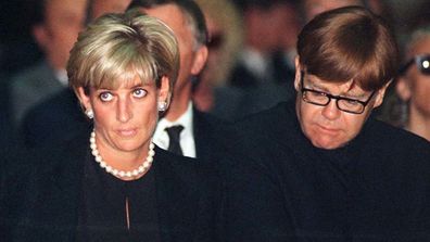 Elton John and Princess Diana attend the funeral of fashion designer Gianni Versace in 1997 shortly before her death.