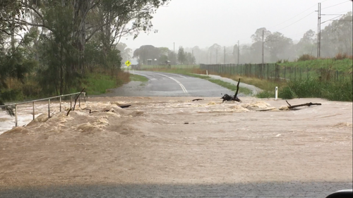 Flash flooding has occurred across Queensland, including at Lowmead. (9NEWS)