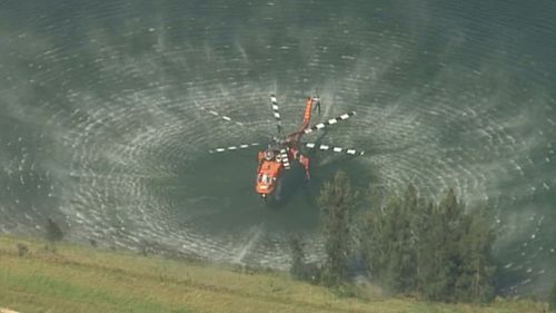Five water bombing helicopters were fighting the blaze.