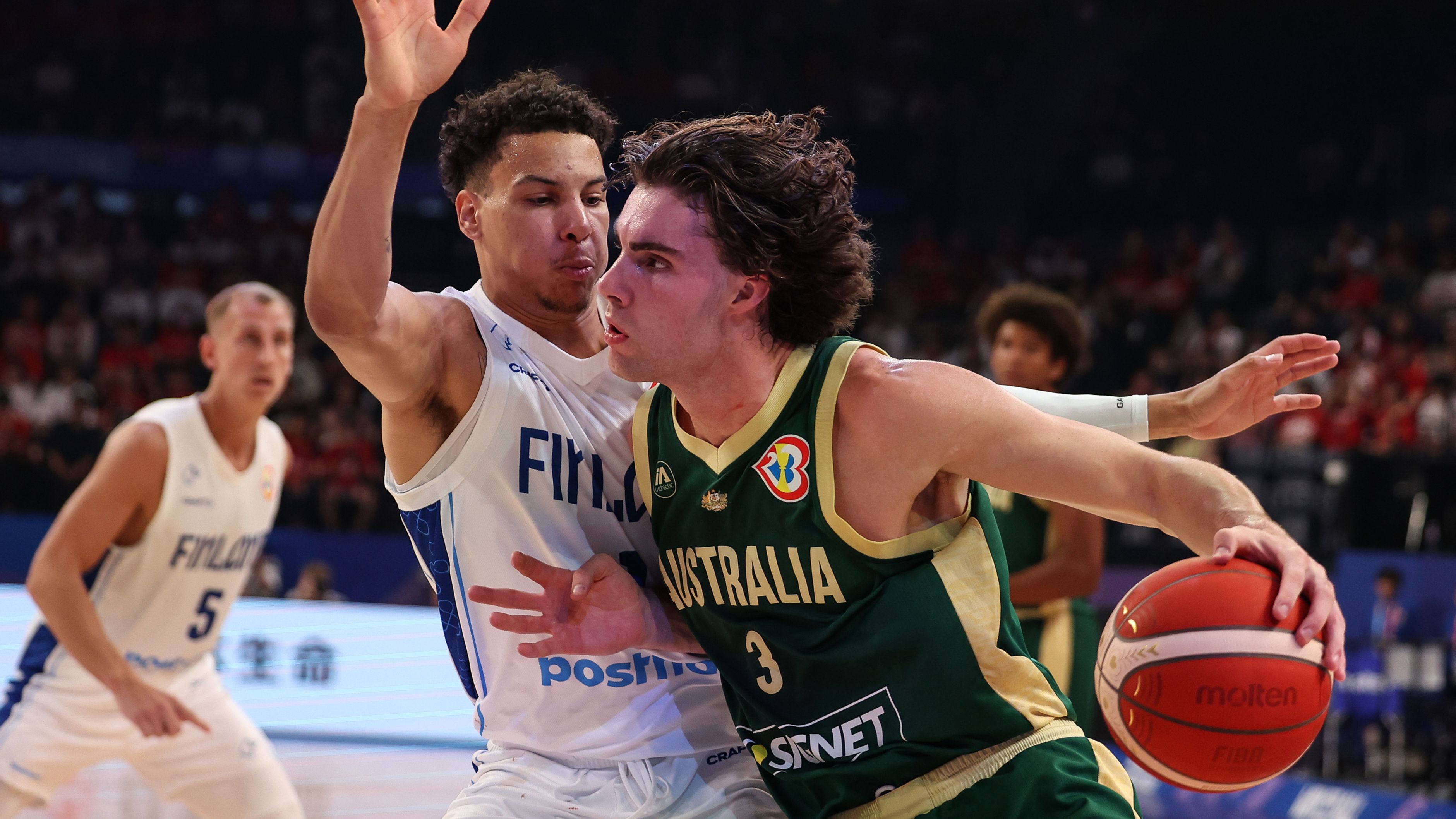 OKINAWA, JAPAN - AUGUST 25: Josh Giddey #3 of Australia drives to the basket against Miro Little #1 of Finland during the FIBA World Cup Group E game between Finland and Australia at Okinawa Arena on August 25, 2023 in Okinawa, Japan. (Photo by Takashi Aoyama/Getty Images)