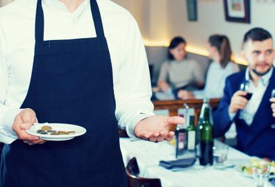 Woman date waiter tip