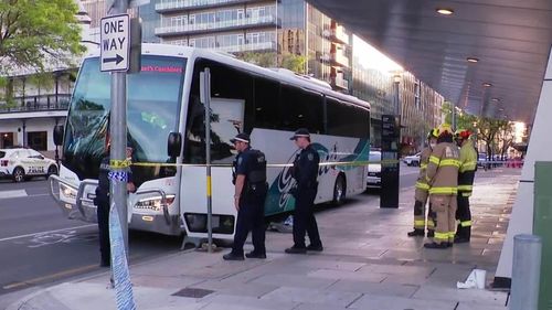 A man has been charged after allegedly assaulting police during a frenzied attempt to hijack a bus packed with tourists in Adelaide. ﻿