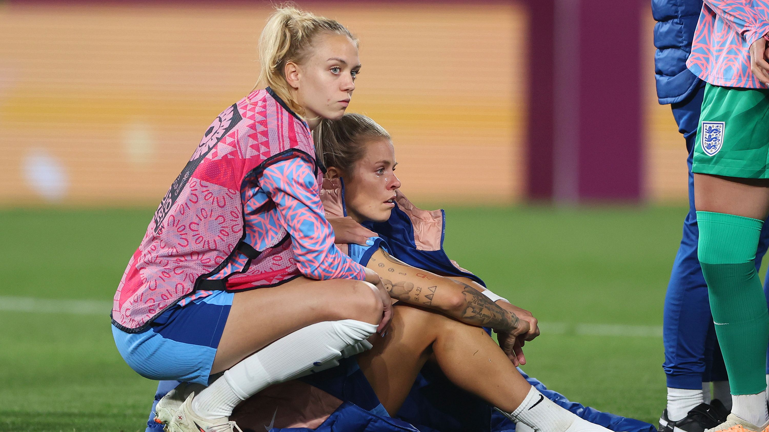 Rachel Daly and Esme Morgan of England look dejected after the team&#x27;s defeat.