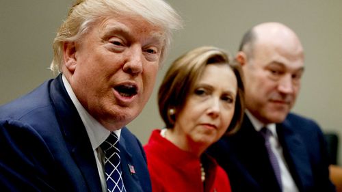 US President Donald Trump (left) and head of the White House national economic council Gary Cohn (far right). (AAP)