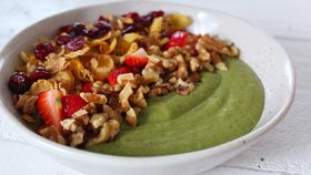 Will and Steve's green smoothie bowl with cereal, berries, passionfruit and toasted walnuts