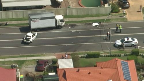 The driver came to an abrupt halt after smashing head-on into a northbound truck. (9NEWS)