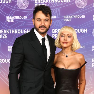 Matthew Rutler and Christina Aguilera attend the 12th Breakthrough Prize Ceremony at Barker Hangar on April 18, 2026 in Santa Monica, California. 