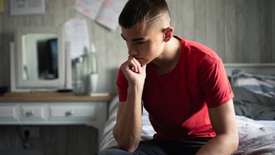 Teen boy thinking pensive anxiety depressed children 